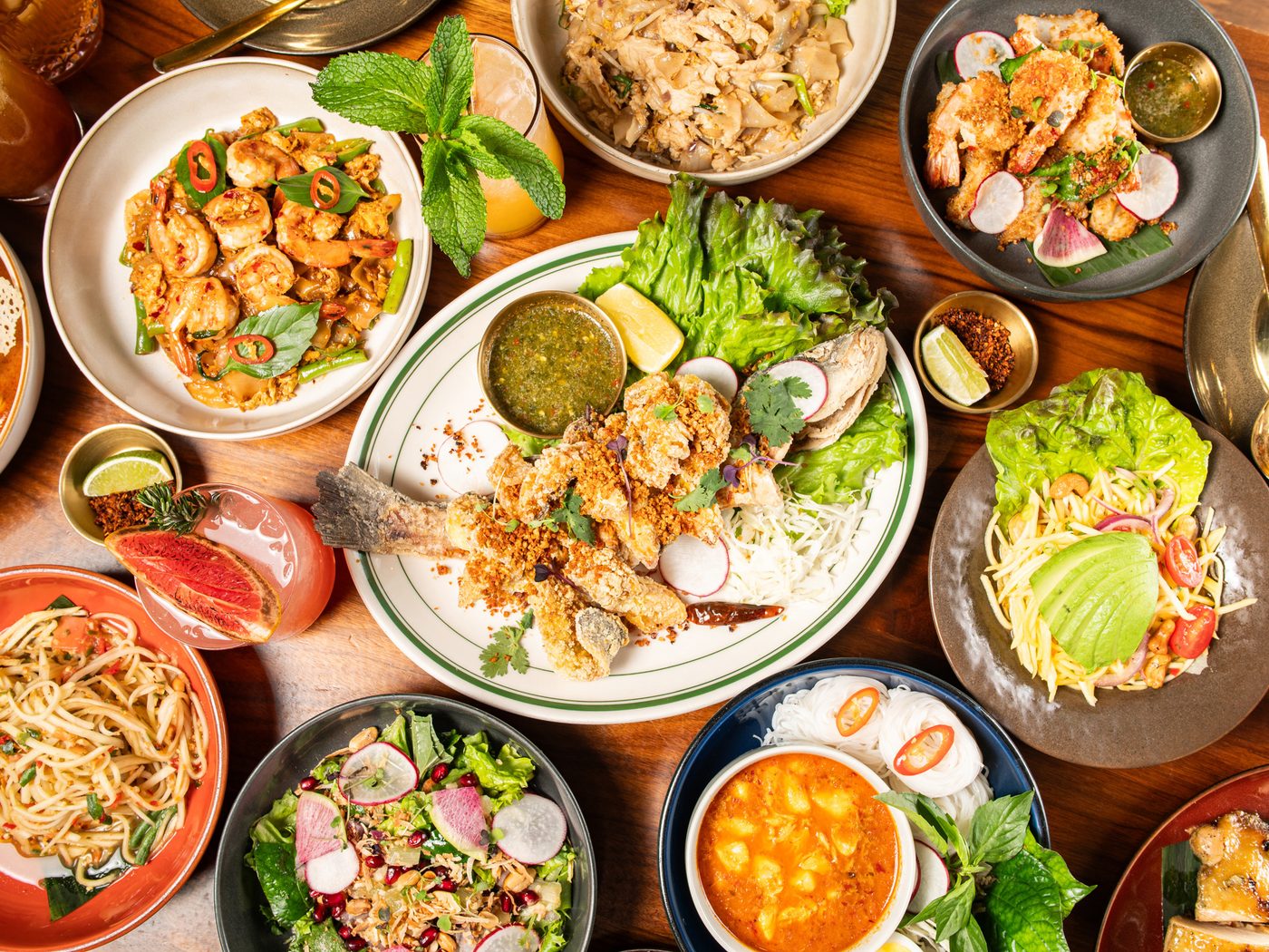 A table full of Mitr Thai dishes, seen from above